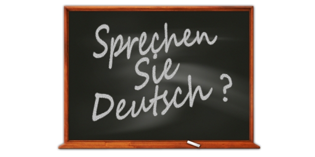 Tafel mit dem Text "Sprechen Sie Deutsch"